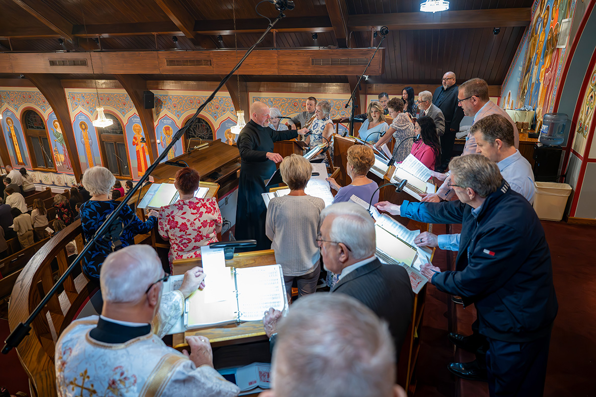 Ben Wharton leads the choir